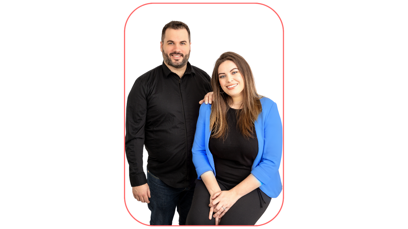 A man in a black shirt and a woman in a blue blazer over a black outfit smiling together, framed within a rounded red border against a white background