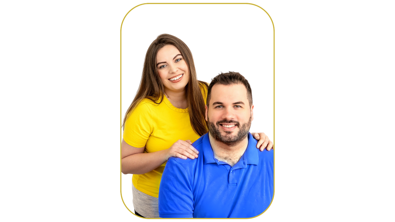 Smiling woman in a yellow shirt standing behind a seated man in a blue shirt, both posing for a photo with a white background encased in a yellow border